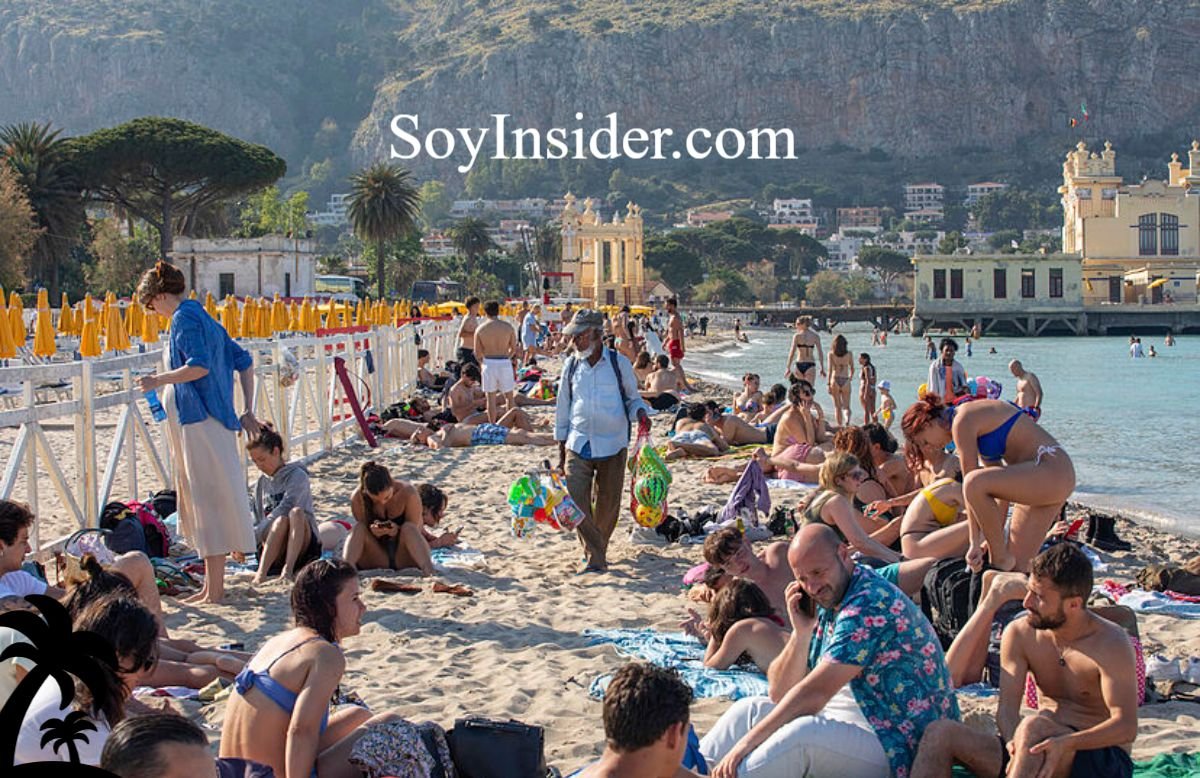 Ejemplo de trabajo informal en la playa: una persona vendiendo juguetes