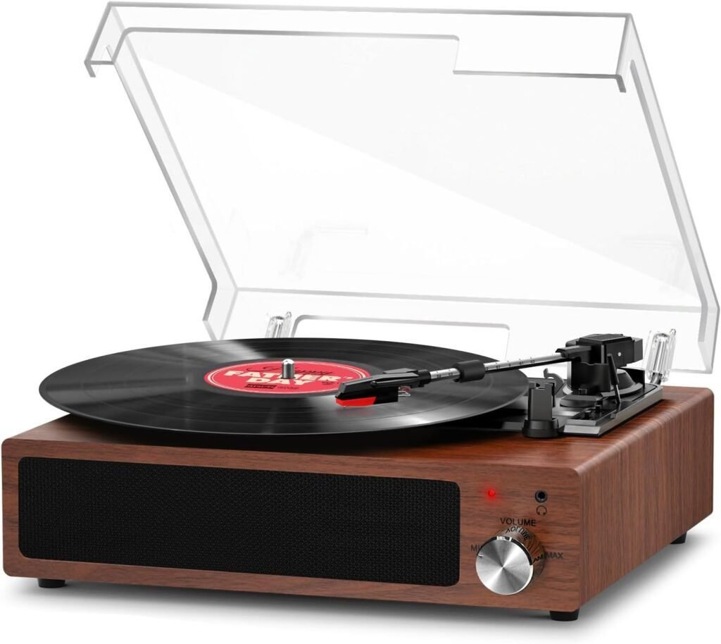 Imagen de un tocadiscos de vinilo moderno con un diseño elegante y acabado en madera, ideal para amantes de la música analógica. Su plato giratorio de alta precisión asegura una reproducción de sonido de calidad. Perfecto para coleccionistas de discos de vinilo y entusiastas de la música retro.