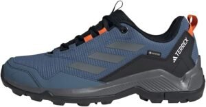 Zapatillas de senderismo **adidas Terrex Eastrail Gore-Tex** para hombre en color [describe el color si es visible]. Diseño resistente al agua con membrana **Gore-Tex**, suela de gran agarre y amortiguación cómoda. Ideales para rutas de montaña y terrenos exigentes. ¡Descubre opiniones y características!