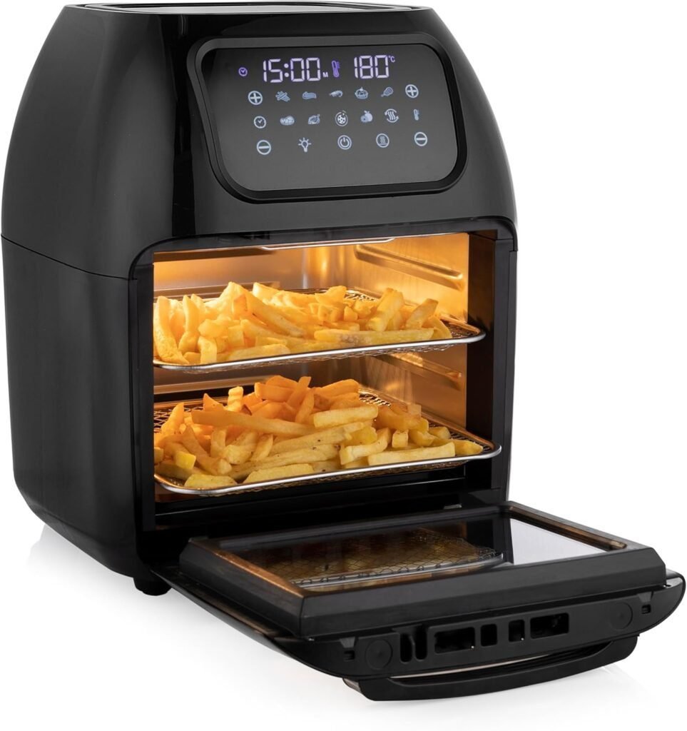 Freidora sin aceite Tristar FR-6964 y horno de aire multifunción en color negro, con gran capacidad y tecnología de circulación de aire caliente para cocinar de forma saludable sin usar aceite. Diseño moderno y compacto, ideal para preparar todo tipo de recetas fácilmente.