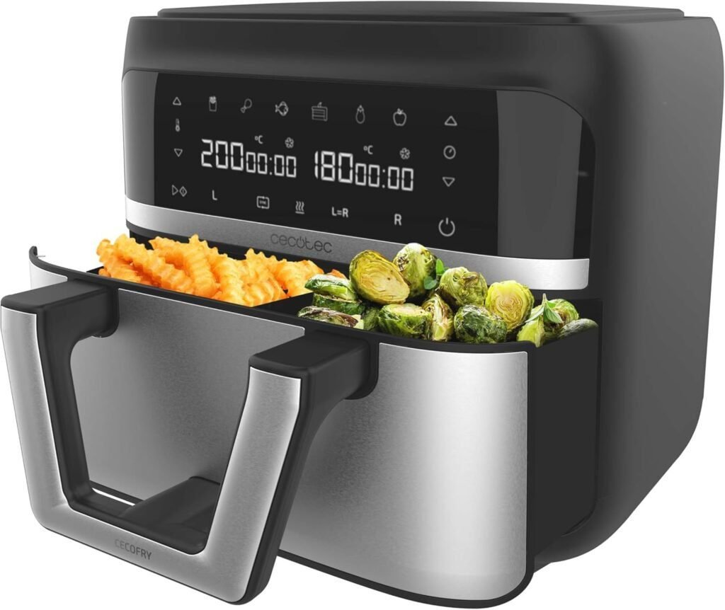 Freidora de aire sin aceite Cecotec de 9L, con diseño divisible en 2 compartimentos para cocinar diferentes alimentos a la vez. Ideal para cocinar de forma saludable con poco o nada de aceite. Tecnología de aire caliente para una cocción rápida y homogénea. diseño moderno y fácil de usar.