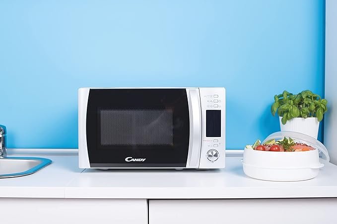 Microondas Candy X-Range CMXG22DS/ST con grill, capacidad de 22 litros, potencia de 1250W, 5 niveles de cocción y control digital, diseño moderno en acero inoxidable.