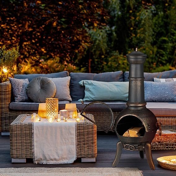 Imagen del producto Relaxdays Chimenea Exterior Grande con salvachispas, atizador y rejilla para leña, ideal para jardines y terrazas; diseño robusto y elegante en color negro, perfecta para noches al aire libre.