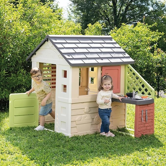 Imagen de la casita infantil Smoby Life Casa Nature con Cocina de Juguete, ideal para interior y exterior; diseño colorido y resistente, perfecta para el juego creativo de niños pequeños.