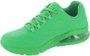 Zapatillas Skechers Uno- Golden Air para mujer en color dorado, diseño moderno y elegante ideal para un look casual o deportivo, destacando su comodidad y estilo innovador.