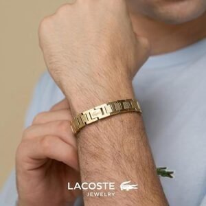 Brazalete Lacoste de eslabón para hombre colección METROPOLE decorado con diseño petit piqué, elegancia moderna en acero inoxidable con distintivo estilo Lacoste.