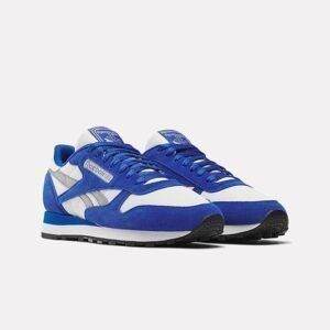 Zapatillas Reebok Classic Leather 001 unisex en color blanco, diseño retro deportivo con logo Reebok visible, suela de goma antideslizante y acabado de cuero suave, ideales para estilo casual y actividades diarias.