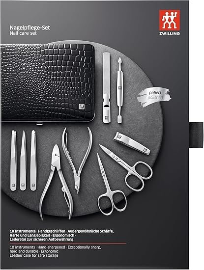 Set de manicura ZWILLING de 10 piezas en elegante estuche de piel auténtica con marco metálico, ideal para el cuidado completo de uñas de manos y pies. Diseño premium y herramientas de alta calidad.