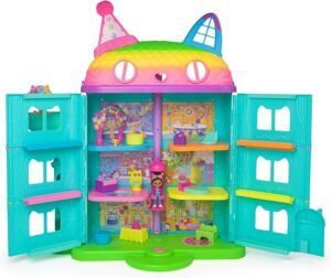 Imagen de la Casa Festiva de Gabby's Dollhouse con luces y sonidos, figura de Gabby incluida, 10 accesorios temáticos arcoíris y 2 cajas sorpresa; juguete ideal para estimular la imaginación infantil y regalo perfecto para niñas y niños fans de Gabby’s Dollhouse.