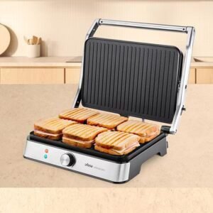 "Descubre la parrilla eléctrica Ufesa Kilimanjaro Panini Press Grill, con 2200W de potencia y placas antiadherentes de 34x23cm. ¡Prepara deliciosos sándwiches con una apertura de 105-108º! Opiniones y precio aquí."