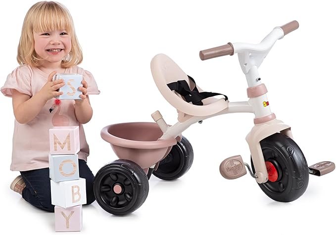 Triciclo evolutivo Smoby Be Fun Rosa con sillín regulable, cinturón de seguridad y bloqueo de dirección, ideal para niñas pequeñas; diseño ergonómico y seguro para primeros paseos.