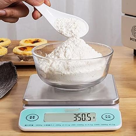 Balanza de alimentos digital AttreX con diseño compacto y pantalla LCD para pesar ingredientes con precisión en la cocina. Ideal para dietas, repostería y control de porciones.