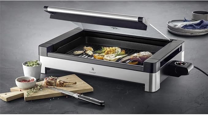 Opiniones WMF Lono - Grill sobremesa con tapa de cristal y Barbacoa 2200 W - imagen del producto.