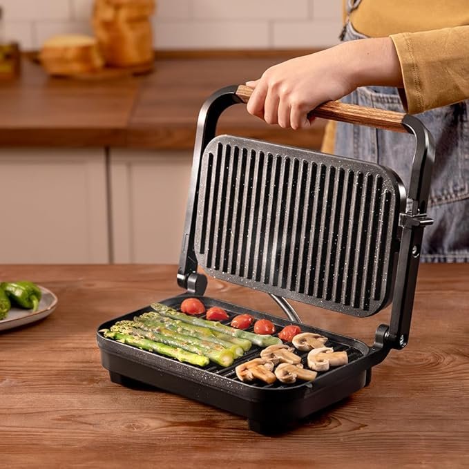 Opiniones Cecotec Parrilla Eléctrica Rock'Ngrill 1300 Wood B - Potencia de 1300W, Diseño Negro, Revestimiento Rockstone, Base Antideslizante. ¡Descubre la mejor parrilla eléctrica para tus comidas favoritas!