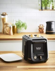 Opiniones Tefal Includeo TT533811 Tostadora, 2 compartimentos, pinzas magnéticas, Tostador botones grandes - Imagen del producto - Tostadora Tefal Includeo TT533811 con 2 compartimentos y pinzas magnéticas, con diseño de botones grandes para mayor facilidad de uso.
