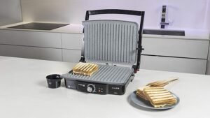 Opiniones Cecotec Parrilla eléctrica Rock'nGrill 2000. 2000 W, Revestimiento Antiadherente RockStone, Apertura 180º - Imagen del producto mostrando su diseño moderno y sus características avanzadas. ¡Compra ya y disfruta de la mejor parrilla eléctrica en tus comidas!