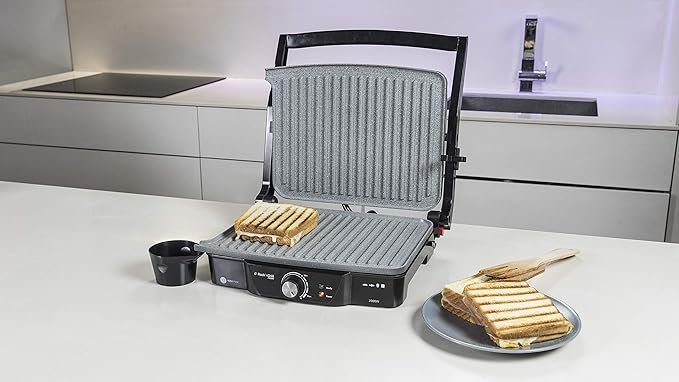 Opiniones Cecotec Parrilla eléctrica Rock'nGrill 2000. 2000 W, Revestimiento Antiadherente RockStone, Apertura 180º - Imagen del producto mostrando su diseño moderno y sus características avanzadas. ¡Compra ya y disfruta de la mejor parrilla eléctrica en tus comidas!